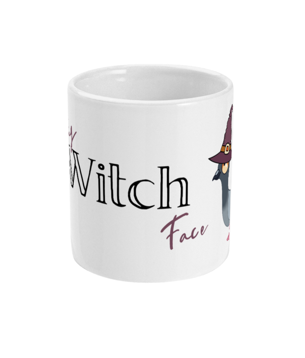 11oz Mug resting witch face mug